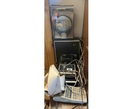 A vintage Panasonic cassette player, Olympus compact camera, pair of JVC stereo headphones, etc.
