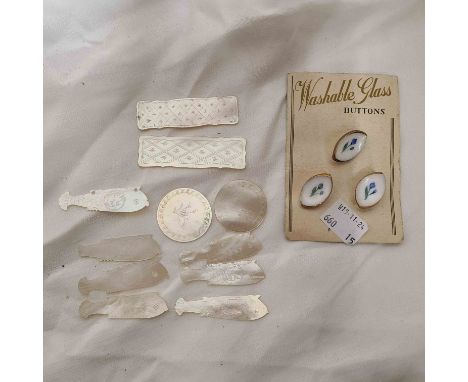 A wooden box containing a small quantity of Chinese mother-of-pearl gaming counters - sold with a card containing three vinta