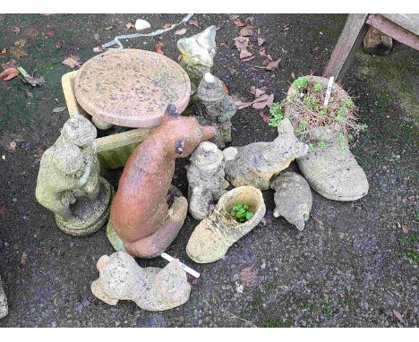 A quantity of concrete garden ornaments of various form