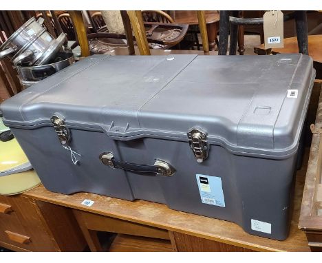 A modern Contico plastic storage trunk