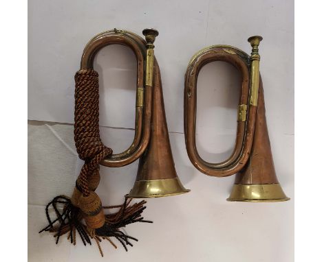 A Victorian copper and brass bugle marked for 'Henry Potter &amp; Co, 30 Charing Cross, London, 1894' - sold with a military 