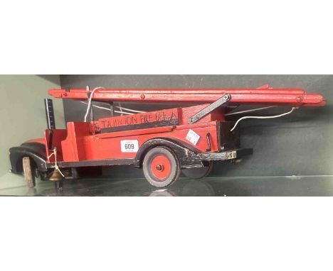 A scratch built model of a fire engine with working lights
