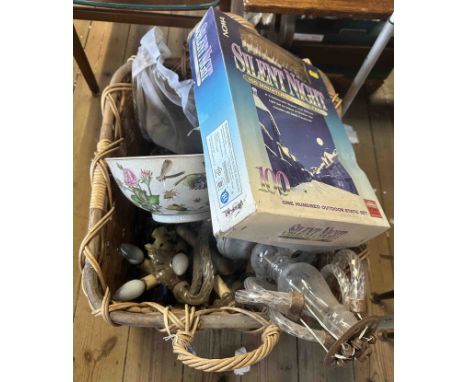 A large wicker basket containing a glass chandelier (for restoration), a modern ceramic glazed bowl and a boxed set of Christ