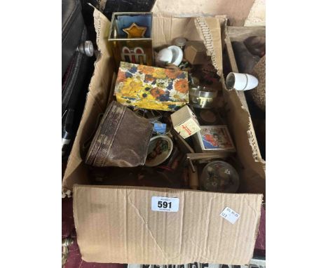 A box containing collectable items including animal figurines, a cased set of binoculars, mother-of-pearl fork, etc.
