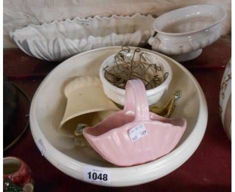 A quantity of flower vases including SylvaC, Wade, etc.