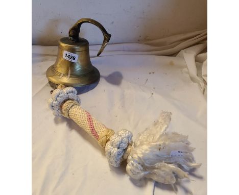 The brass bar bell from the Church House Inn, Stoke Gabriel
