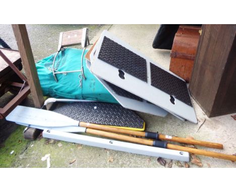 An Avon Redcrest inflatable dinghy with two oars, base boards, air&nbsp;bellows and metal step