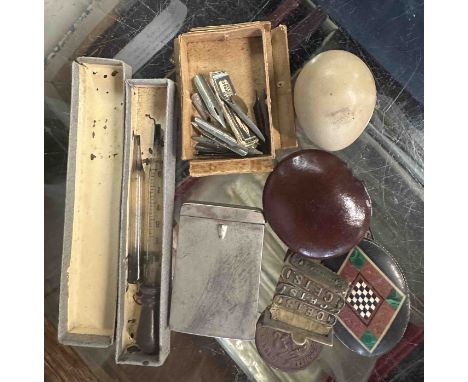 A small quantity of collectable items including early 20th century Ever Ready illuminated watch stand, medallions, powder com