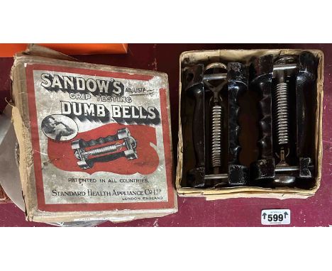 A boxed set of Sandow's dumbbells with original instruction leaflet and diagrams together with a free consultation certificat