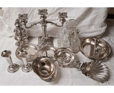 A box containing a quantity of silver plated items including four piece condiment set, twin branch three light candelabrum, p
