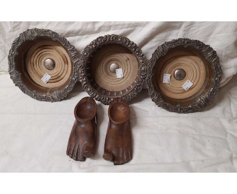 Three antique silver plated copper wine coasters of varying design - sold with a pair of carved wood trinket dishes in the fo