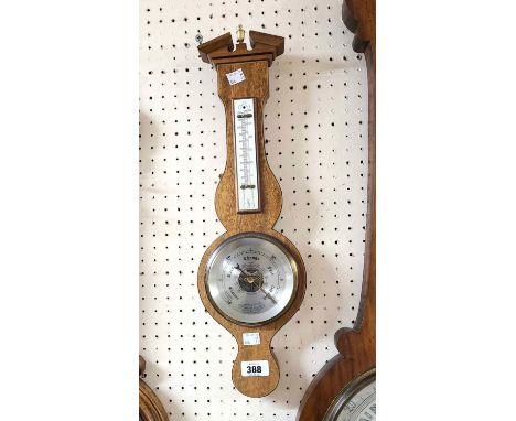 A 20th Century Comitti of London mahogany and strung cased small banjo barometer/thermometer with visible aneroid works