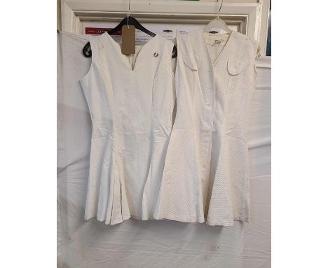 A vintage Fred Perry tennis dress - sold with a similar Perfit button up tennis dress