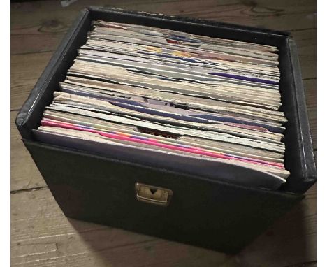 A box containing vintage single records including Bow Wow Wow, Elvis Costello, etc.