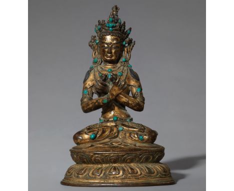   Vajradhara. Feuervergoldet Bronze. Tibet. 16. Jh.  Der Adhibuddha sitzt auf einem doppelten Lotosthron, seine Attribute Vaj