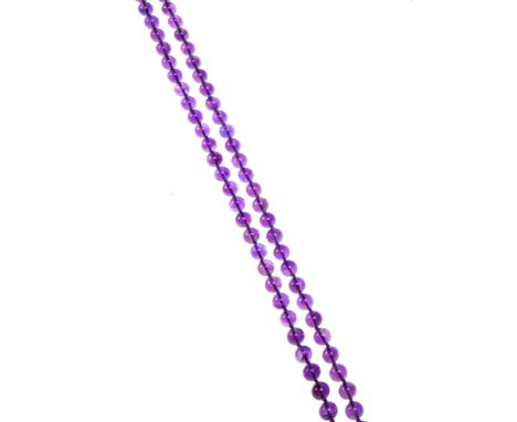 A collection of beaded necklaces, comprised of a knotted strand of amethyst beads; together with another strand of amethyst b