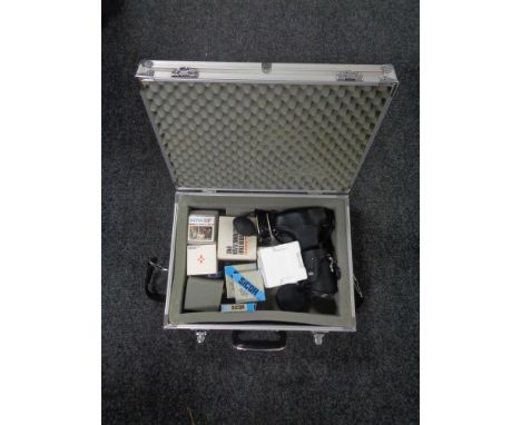 An aluminum case of Chinon CM-4X camera, with lens and accessories 