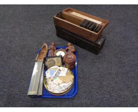 Two boxes of glass slides, tray of stamps, wooden tea caddy, barometer, two boxed miniature chandelier (one by Georg Jensen) 