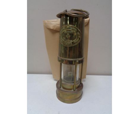 A brass E. Thomas &amp; Williams miner's lamp. 
