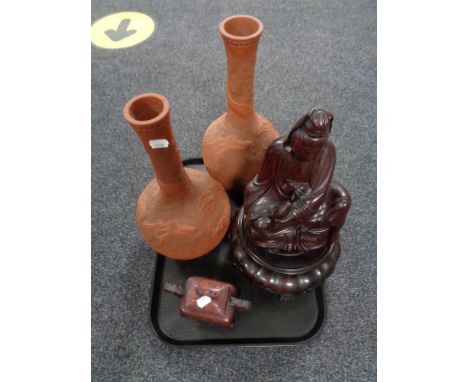 A tray of carved hardwood figure - Eastern god on stand, carved table box, pair of Chinese pottery dragon vases.