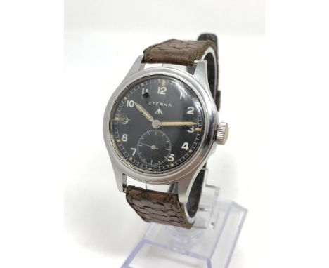 A stainless steel British Military Eterna wristwatch, of the so-called 'Dirty Dozen' family of wristwatches produced for the 