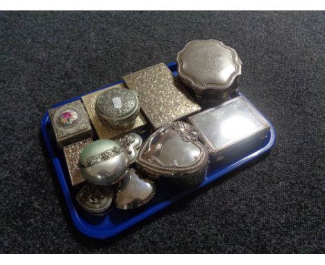 A tray of metal trinket and jewellery boxes. 