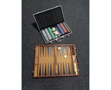 A cased backgammon set and a case of poker chips 