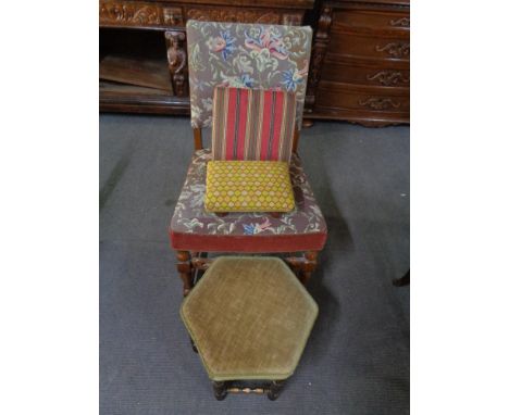 A carved oak tapestry armchair and three various footstools 