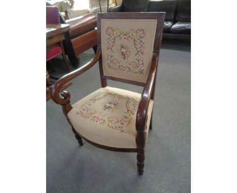 A scroll arm armchair in tapestry fabric 
