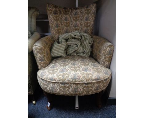 A 20th century tapestry upholstered armchair 