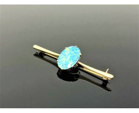A yellow gold opal bar brooch 
