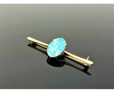 A yellow gold opal bar brooch 