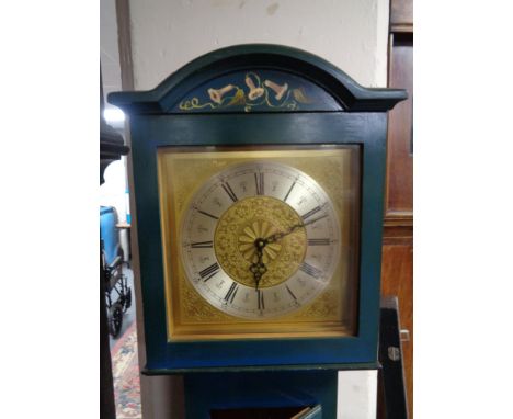 A 20th century hand painted longcase clock with brass dial 