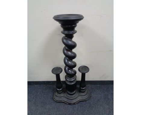 A carved early twentieth century plant pedestal 