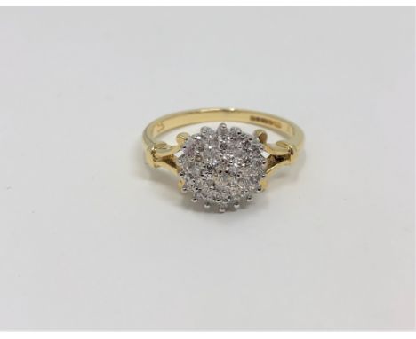 An 18ct gold diamond cluster ring, size K CONDITION REPORT: 3.4g