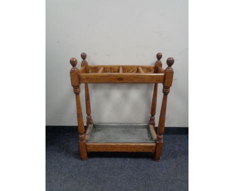 An early twentieth century oak stick stand 