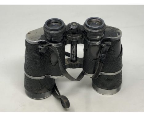 A pair of vintage Carl Zeiss binoculars 10 x 50 CONDITION REPORT: Lens fog and haze, they appear to be well used and corroded