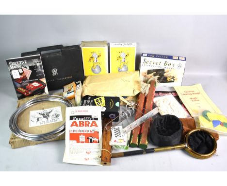 A Collection of Various Modern Conjurer's Tricks, Props, Playing Cards and Instruction Books etc.