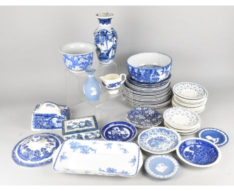A Collection of Various Blue and White to Comprise Willow Pattern Dinnerwares, Japanese Vase, Prunus Planter, Wedgwood Jasper