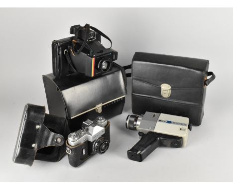 A Vintage Russian Zenit-B Camera together with a Polaroid Swinger III and a Chinon Dart Super 8 Movie Camera