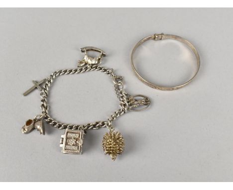 A Sterling Silver Charm Bracelet with Various White Metal Charms, 27g Together with a Silver Christening Bangle, 8.2g
