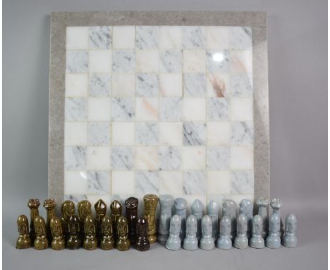 A Modern Glazed Ceramic Chess Set with Reconstituted Marble Board, Two Chess Pieces Glued, Board 44cm Square