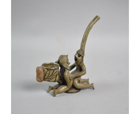 A Novelty Erotic Peruvian Pipe with Coin Base, 9cm High