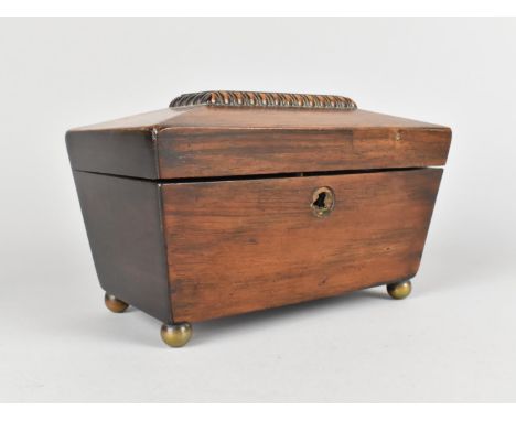 A 19th Century Mahogany Two Division Tea Caddy of Sarcophagus Form, Four Brass Ball Feet, 20cm Wide