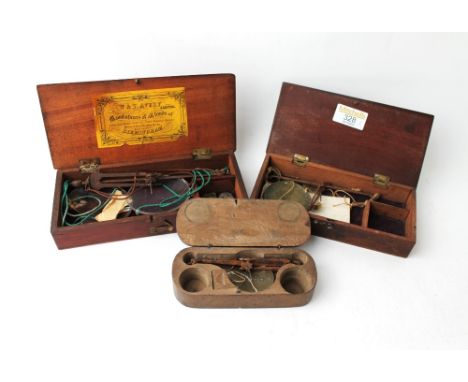 Avery balance scales in mahogany box and two other sets of vintage scales