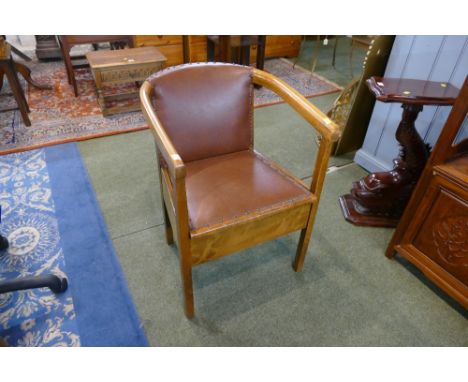 Red leather upholstered carver commode chair 