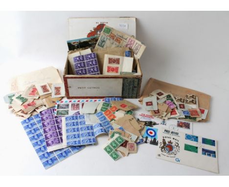 A wooden cigar box containing GB and World stamps, first day covers etc.