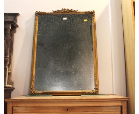 Ornate gilt coloured mirror with decoration to the top "Light of the World", 77 cm x 64 cm