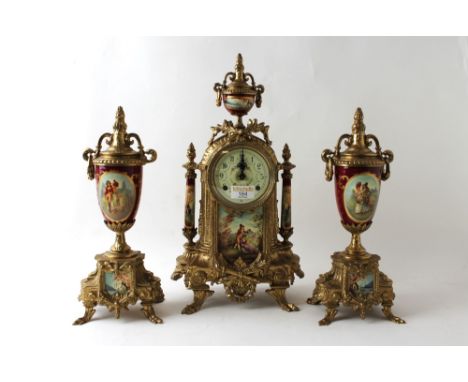 German brass clock garniture, movement marked Franz Hermle, 42 cm high
