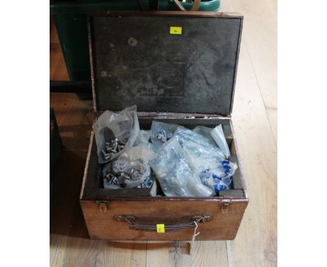Wooden trunk containing nuts and bolts 